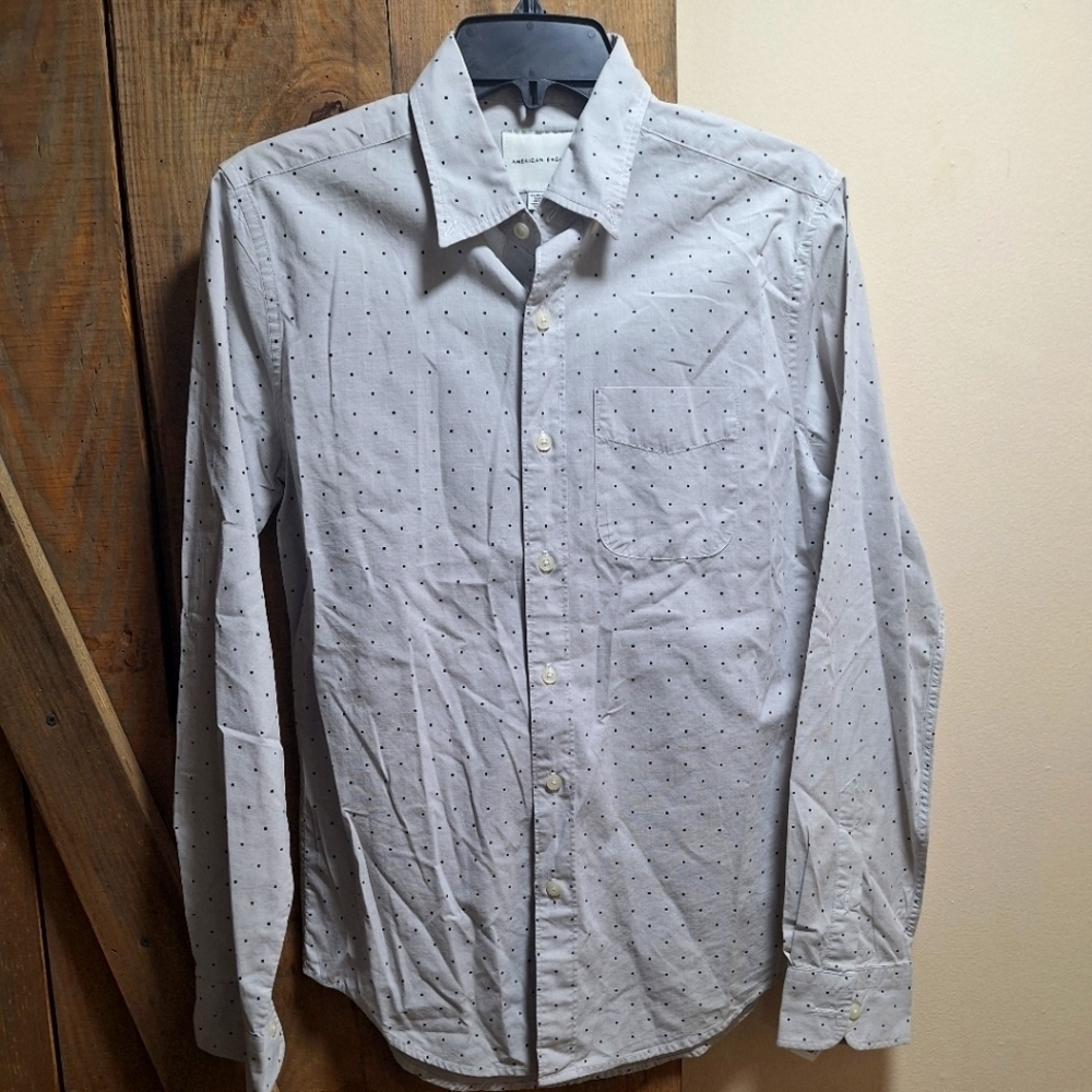 An American Eagle Outfitters long sleeve button-down polka dot shirt in an XS.